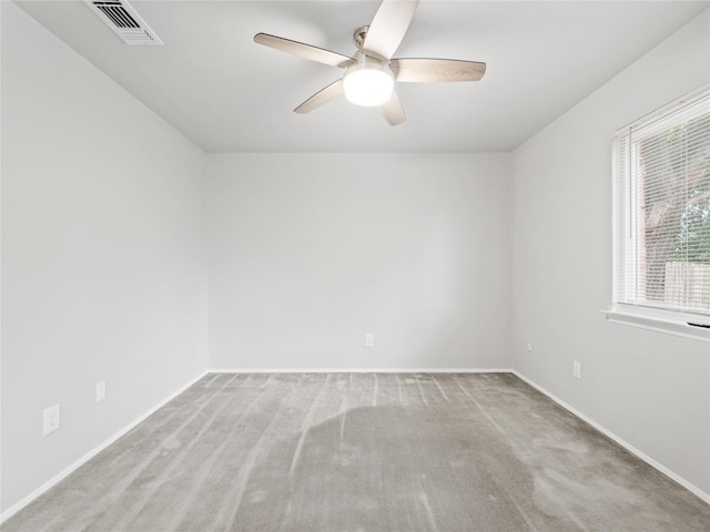 2036 Pearl Ln, Irving, TX 75060 - spare room featuring a ceiling fan, carpet, and baseboards