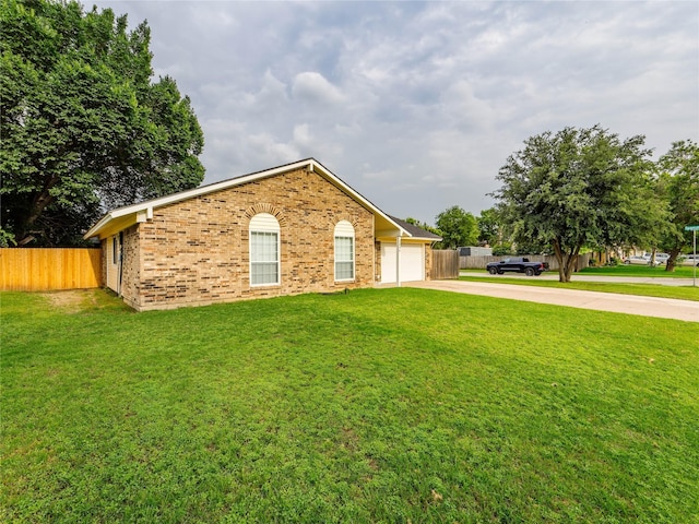 2036 Pearl Ln, Irving, TX 75060 - view of front of house with driveway, brick siding, and a garage