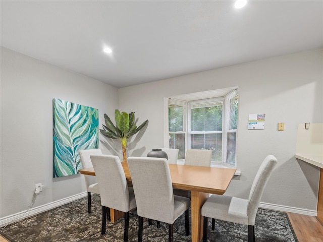 2036 Pearl Ln, Irving, TX 75060 - dining room with baseboards, wood finished floors, and recessed lighting