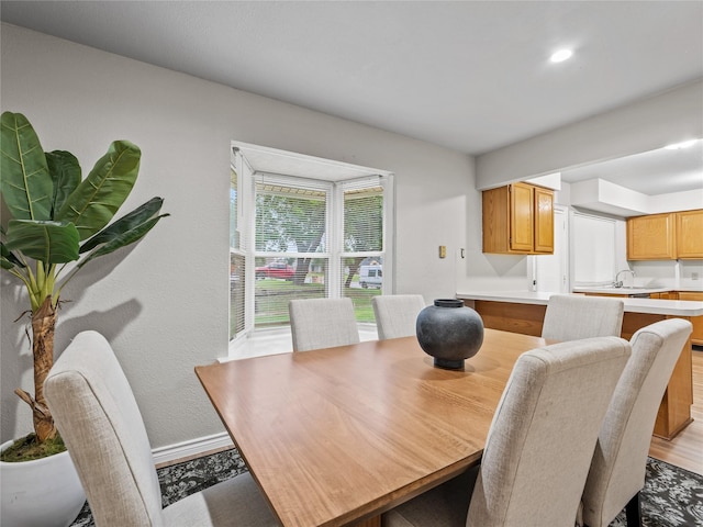 2036 Pearl Ln, Irving, TX 75060 - dining space with light wood finished floors and baseboards