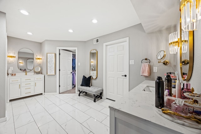 510 Columbia Dr, Rockwall, TX 75032 - full bathroom with vanity, marble finish flooring, and recessed lighting