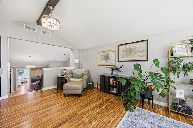 510 Columbia Dr, Rockwall, TX 75032 - sitting room with wood finished floors, an upstairs landing, and baseboards