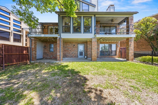 510 Columbia Dr, Rockwall, TX 75032 - rear view of property with a balcony, brick siding, a patio, a ceiling fan, and a chimney