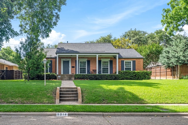9914 Woodgrove Dr, Dallas, TX 75218 - view of front facade with brick siding, a porch, and roof with shingles