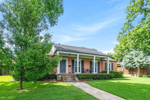 9914 Woodgrove Dr, Dallas, TX 75218 - view of front facade with brick siding and covered porch