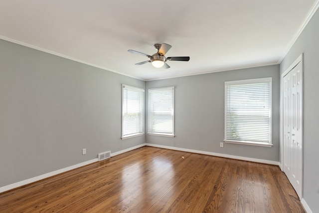 9914 Woodgrove Dr, Dallas, TX 75218 - empty room with baseboards, plenty of natural light, ceiling fan, and crown molding