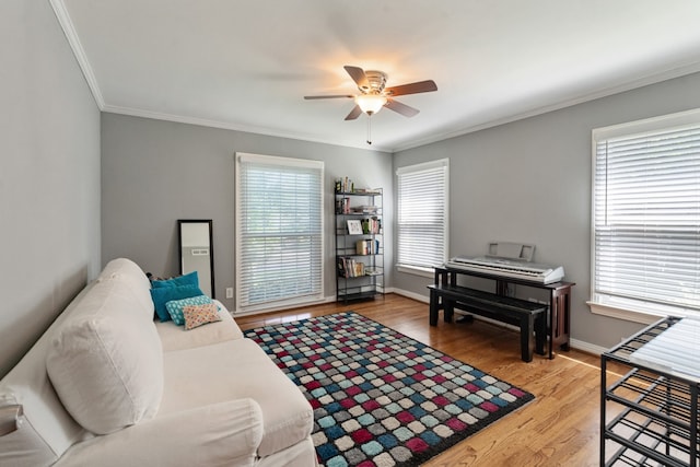 9914 Woodgrove Dr, Dallas, TX 75218 - living room with crown molding, a ceiling fan, light wood-style floors, and baseboards
