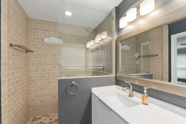 9914 Woodgrove Dr, Dallas, TX 75218 - full bathroom with a tile shower and vanity