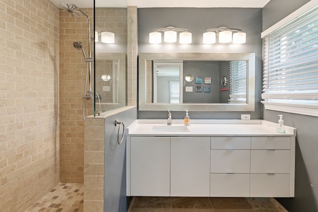 9914 Woodgrove Dr, Dallas, TX 75218 - full bathroom featuring a tile shower and vanity