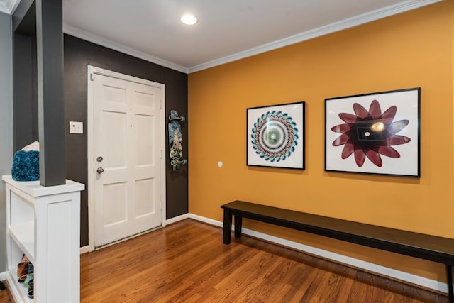 9914 Woodgrove Dr, Dallas, TX 75218 - foyer entrance featuring wood finished floors, baseboards, ornamental molding, and recessed lighting