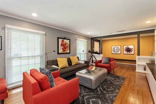 9914 Woodgrove Dr, Dallas, TX 75218 - living area with crown molding, wood finished floors, and recessed lighting