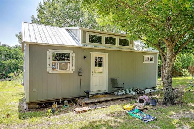 1312 Robyn Rd, Azle, TX 76020 - view of front of property with an outdoor structure, metal roof, and cooling unit