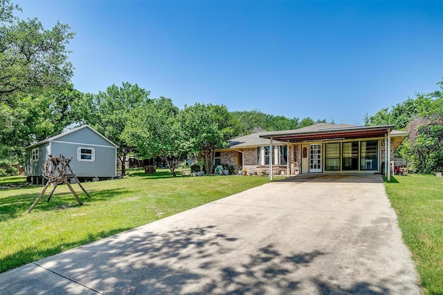 1312 Robyn Rd, Azle, TX 76020 - rear view of property with concrete driveway and a lawn