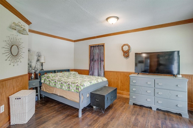 1312 Robyn Rd, Azle, TX 76020 - bedroom featuring wainscoting, wooden walls, crown molding, and wood finished floors
