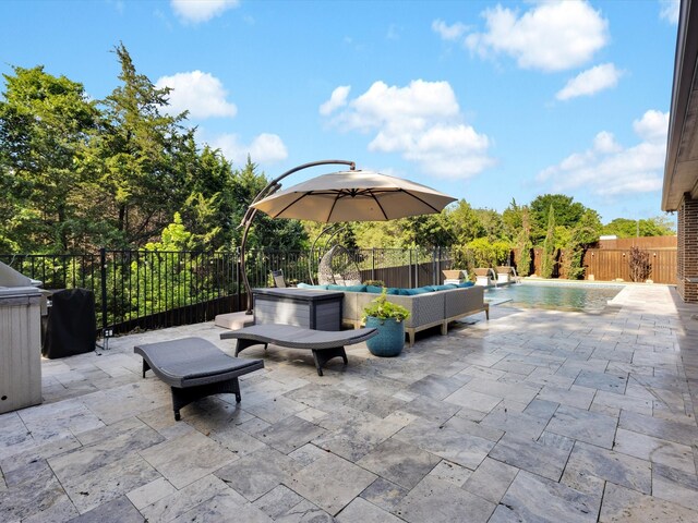 318 Arcadia Way, Rockwall, TX 75087 - fenced backyard with outdoor lounge area and a patio area