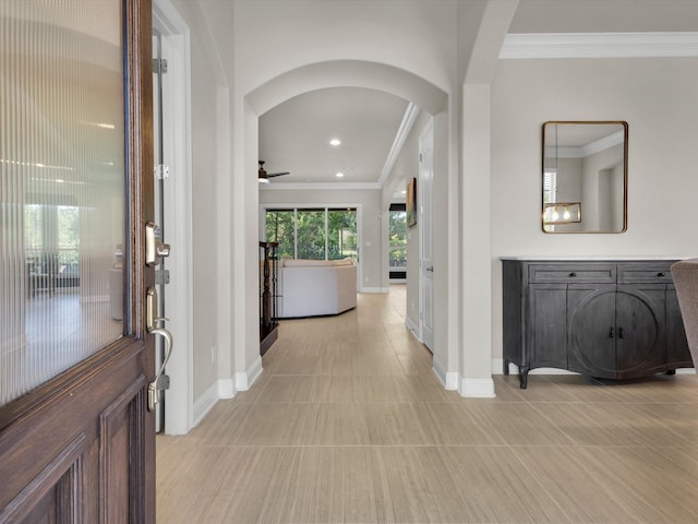 318 Arcadia Way, Rockwall, TX 75087 - corridor with arched walkways, ornamental molding, and baseboards