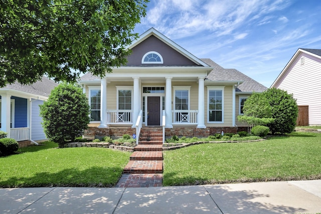 8256 Bridge St, North Richland Hills, TX 76180 - neoclassical home featuring a porch, a front yard, and roof with shingles