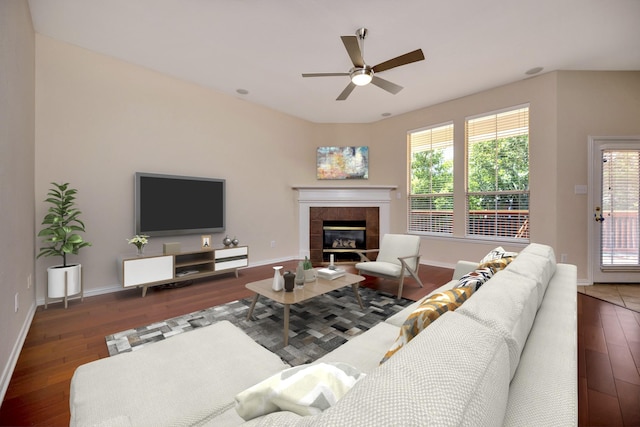 8256 Bridge St, North Richland Hills, TX 76180 - living area with hardwood / wood-style flooring, a ceiling fan, baseboards, and a fireplace