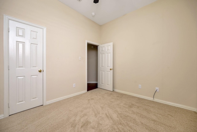 8256 Bridge St, North Richland Hills, TX 76180 - unfurnished bedroom featuring carpet, baseboards, and a ceiling fan