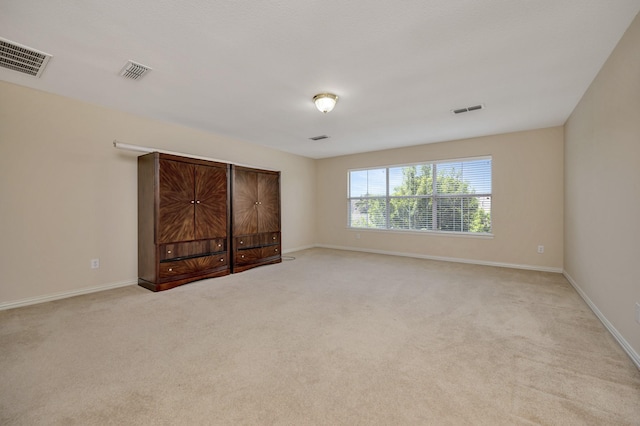 8256 Bridge St, North Richland Hills, TX 76180 - unfurnished bedroom featuring light carpet and baseboards