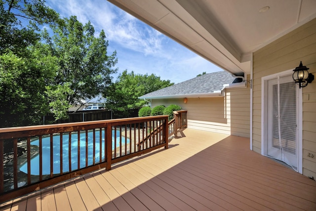 8256 Bridge St, North Richland Hills, TX 76180 - wooden terrace featuring a fenced backyard