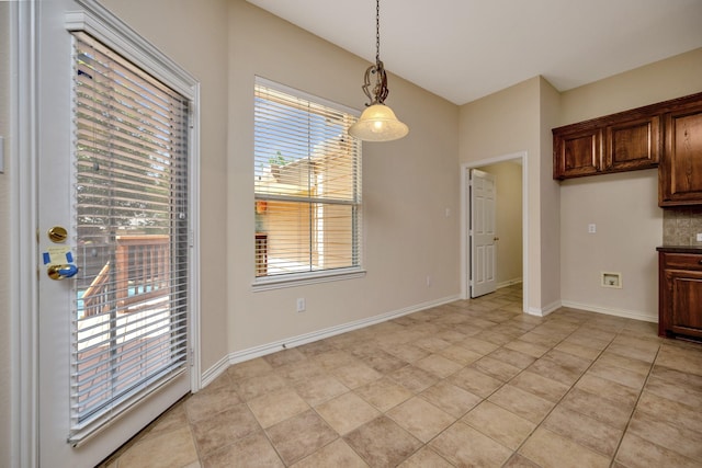 8256 Bridge St, North Richland Hills, TX 76180 - unfurnished dining area with baseboards