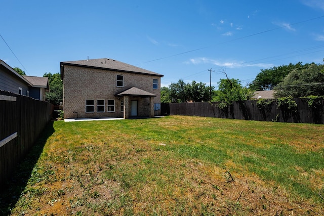 3005 S Jennings Ave, Fort Worth, TX 76110 - rear view of property featuring a patio area and brick siding