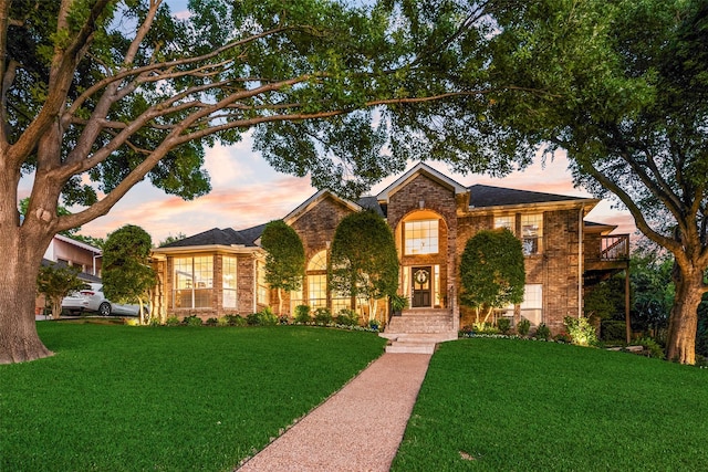 7709 Westwind Dr, Fort Worth, TX 76179 - traditional home with brick siding and a lawn
