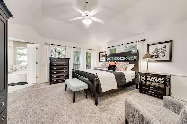 7709 Westwind Dr, Fort Worth, TX 76179 - bedroom with multiple windows, vaulted ceiling, carpet flooring, and ensuite bath