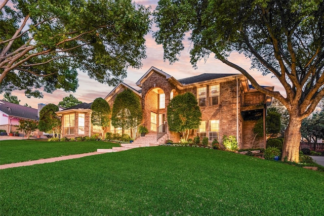 7709 Westwind Dr, Fort Worth, TX 76179 - traditional home with brick siding and a front lawn