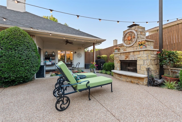 7709 Westwind Dr, Fort Worth, TX 76179 - view of patio with an outdoor stone fireplace and ceiling fan