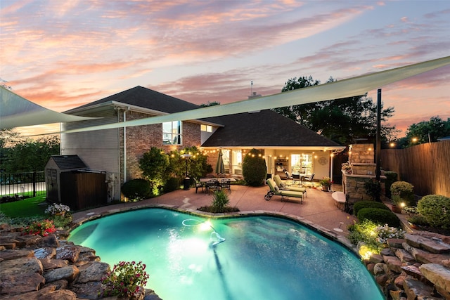 7709 Westwind Dr, Fort Worth, TX 76179 - view of swimming pool featuring a patio area and a fenced backyard