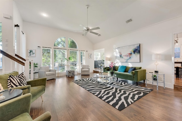 7709 Westwind Dr, Fort Worth, TX 76179 - living area featuring ceiling fan, wood finished floors, high vaulted ceiling, and baseboards
