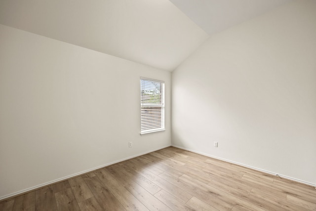 332 Butternut Dr, Fate, TX 75087 - unfurnished room featuring vaulted ceiling, light wood-style floors, and baseboards