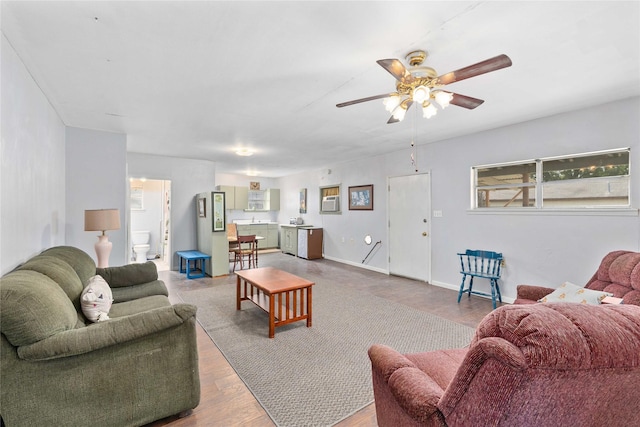 201 S 1st St, Bangs, TX 76823 - living area featuring ceiling fan and wood finished floors