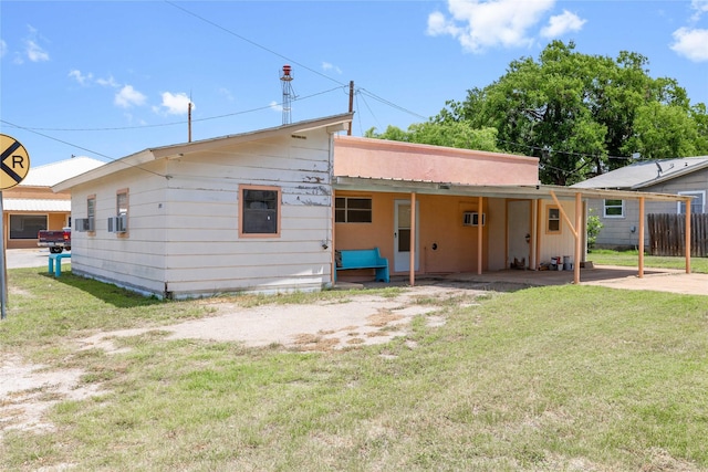 201 S 1st St, Bangs, TX 76823 - back of property with an attached carport