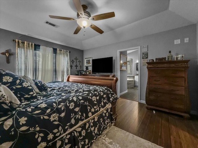 7409 Harbor Dr, Rowlett, TX 75088 - bedroom featuring hardwood / wood-style floors, ensuite bath, ceiling fan, a tray ceiling, and baseboards