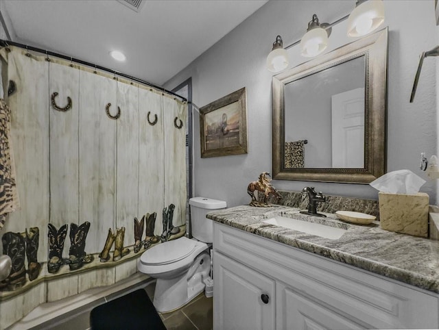 7409 Harbor Dr, Rowlett, TX 75088 - bathroom featuring vanity, toilet, and a shower with shower curtain