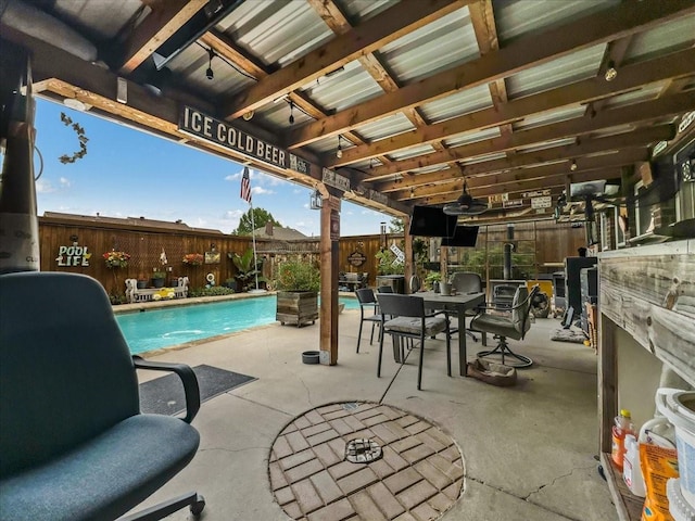 7409 Harbor Dr, Rowlett, TX 75088 - fenced backyard featuring ceiling fan and a patio area