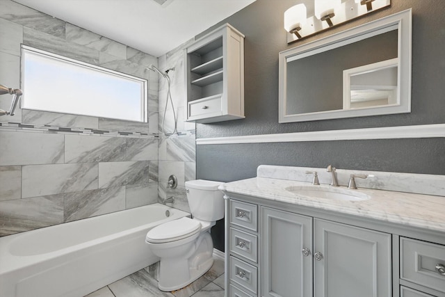 7100 Fox Dr, The Colony, TX 75056 - full bath featuring toilet, shower / bathtub combination, vanity, and a textured wall