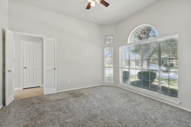 7100 Fox Dr, The Colony, TX 75056 - empty room with carpet floors, ceiling fan, and baseboards