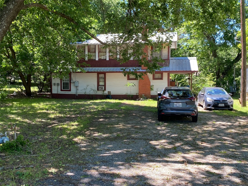 616 Rice St, Denison, TX 75020 - view of front of home with metal roof
