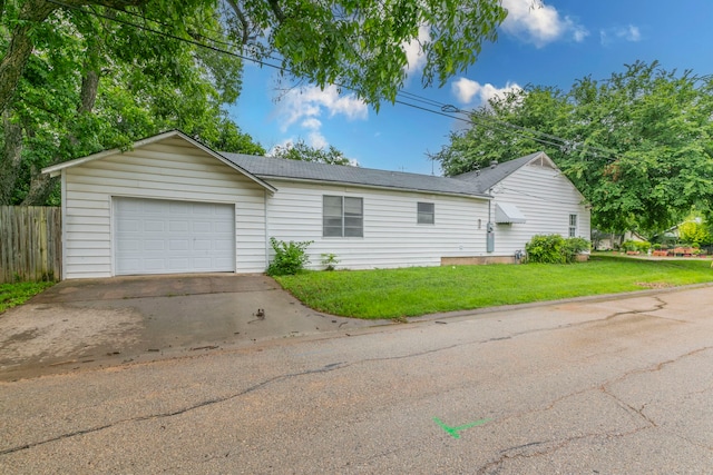 901 E Walnut St, Hillsboro, TX 76645 - ranch-style home featuring concrete driveway, an attached garage, and a shingled roof
