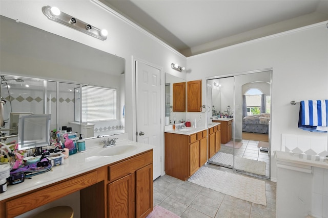 9829 Crawford Farms Dr, Fort Worth, TX 76244 - ensuite bathroom featuring tile patterned flooring, vanity, a stall shower, and ornamental molding