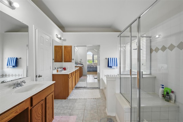 9829 Crawford Farms Dr, Fort Worth, TX 76244 - ensuite bathroom with two vanities, tile patterned floors, a stall shower, and a garden tub