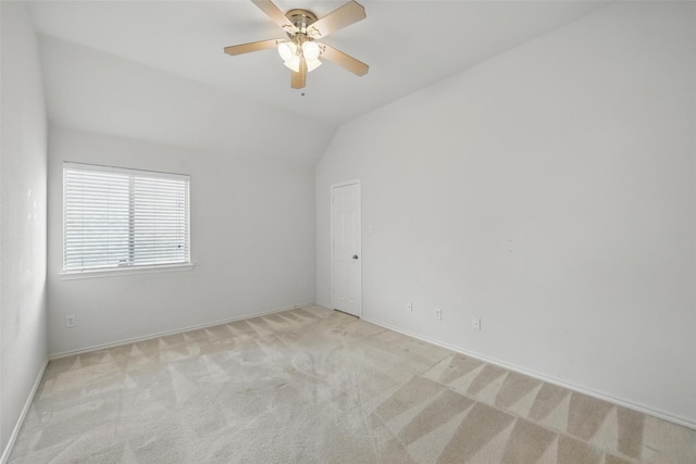 9829 Crawford Farms Dr, Fort Worth, TX 76244 - spare room with light carpet, a ceiling fan, vaulted ceiling, and baseboards