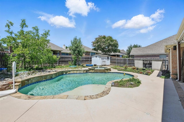 9829 Crawford Farms Dr, Fort Worth, TX 76244 - view of swimming pool featuring a patio area, a fenced backyard, and a pool with connected hot tub