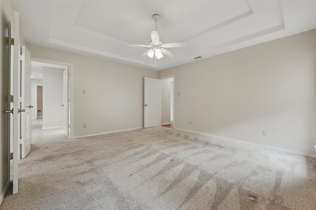 5518 Oak Branch Dr, Arlington, TX 76016 - unfurnished bedroom with a raised ceiling, carpet floors, and baseboards