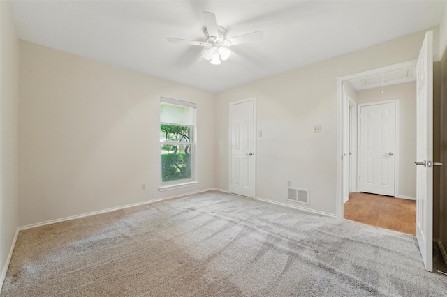 5518 Oak Branch Dr, Arlington, TX 76016 - carpeted spare room featuring attic access, ceiling fan, and baseboards