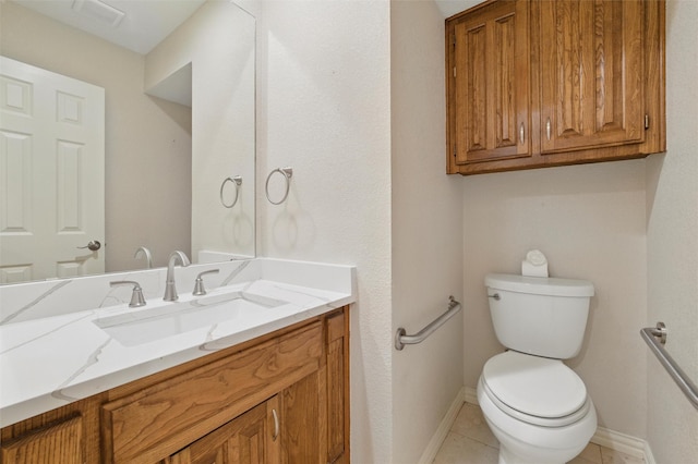 5518 Oak Branch Dr, Arlington, TX 76016 - bathroom with vanity, toilet, baseboards, and tile patterned flooring